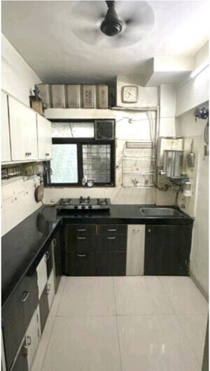 Kitchen in 2 BHK Apartment at Sukur Residency B1 CHS Ltd, Kasarvadavali – for Sale