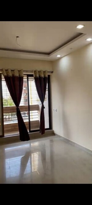 Living Room in 2 BHK Apartment at Rustomjee Avenue M, Virar West – for Rent