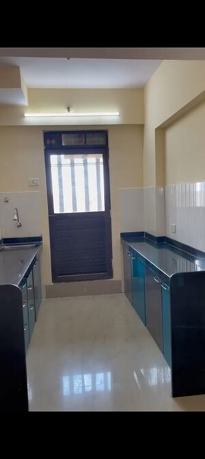 Kitchen in 2 BHK Apartment at Rustomjee Avenue M, Virar West – for Rent