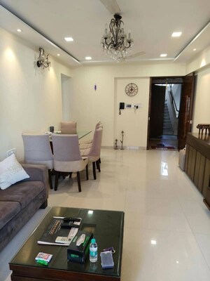 Living Room in 2 BHK Apartment at Laxmi Vihar Khar, Khar West – for Rent