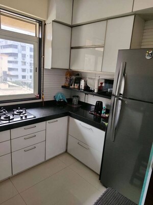 Kitchen in 2 BHK Apartment at Laxmi Vihar Khar, Khar West – for Rent