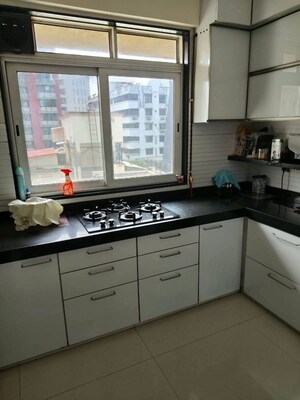 Kitchen in 2 BHK Apartment at Laxmi Vihar Khar, Khar West – for Rent