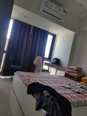 Living Room in 1 BHK Apartment at Queenstown Springs, Ghansoli – for Rent