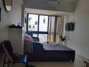 Living Room in 1 BHK Apartment at Queenstown Springs, Ghansoli – for Rent