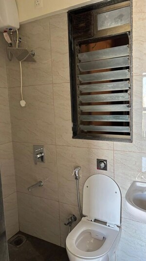 Bathroom in 1 BHK Apartment at Vrindavan Akshaya CHS, Vrindavan Society – for Rent