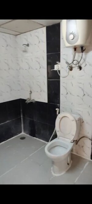 Bathroom in 2.5 BHK Apartment at Mahagun Moderne, Sector 78 – for Rent