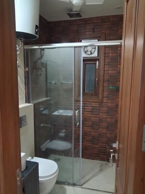 Bathroom in 4 BHK Apartment at Green Park Extension – for Rent