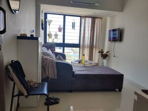 Living Room in 1 BHK Apartment at Queenstown Springs, Ghansoli – for Rent