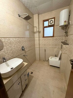 Bathroom in 3.5 BHK Builder Floor at Orchid Island, Sector 51 – for Rent