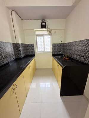 Kitchen in 1 BHK Apartment at Lodha Amara, Kolshet Road – for Rent