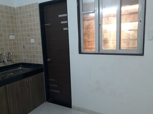 Kitchen in 2 BHK Apartment at SS Rutuparna, Moshi – for Rent