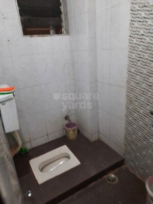 Bathroom in 1 BHK Apartment at Chamunda Residency, Ghansoli – for Rent