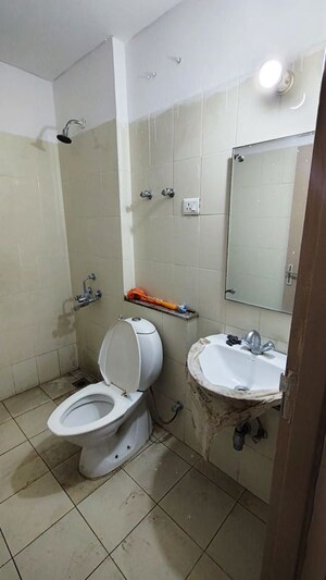 Bathroom in 2.5 BHK Builder Floor at Smart World Gems, Sector 89 – for Rent