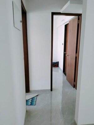Building Lobby in 2 BHK Apartment at Tulip Infinity Planet, Moshi – for Rent