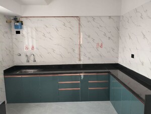 Kitchen in 2 BHK Apartment at Tulip Infinity Planet, Moshi – for Rent