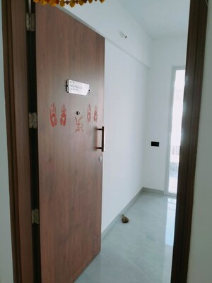 Building Lobby in 2 BHK Apartment at Tulip Infinity Planet, Moshi – for Rent