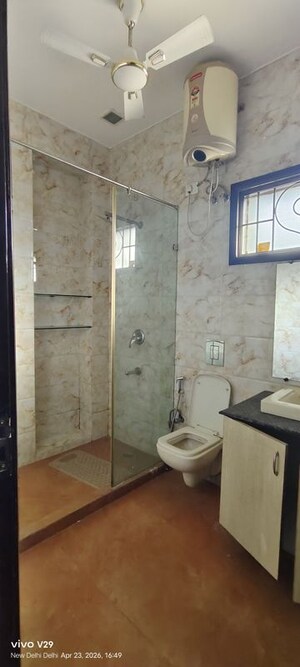 Bathroom in 3 BHK Builder Floor at Pamposh Enclave – for Sale