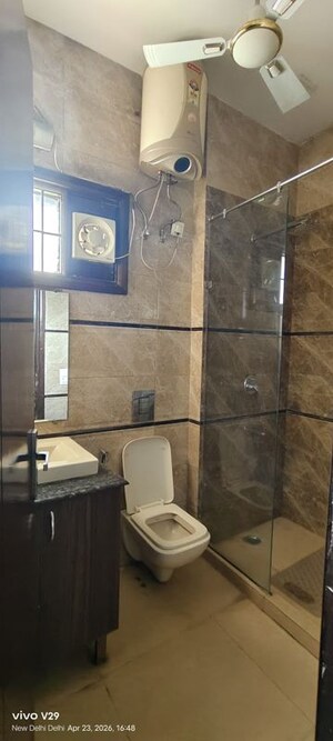 Bathroom in 3 BHK Builder Floor at Pamposh Enclave – for Sale