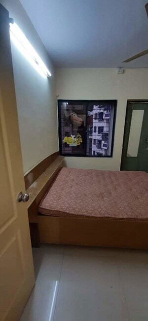 Bedroom in 2 BHK Apartment at Vimla Plaza, Ghansoli – for Rent