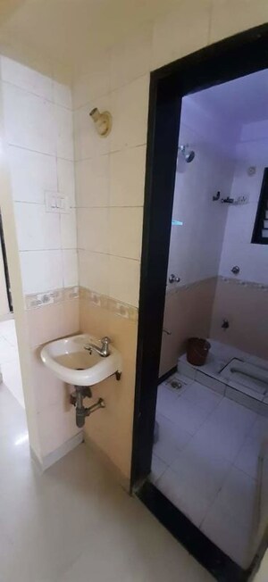 Bathroom in 2 BHK Apartment at Vimla Plaza, Ghansoli – for Rent
