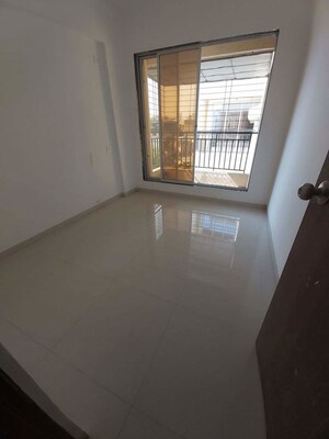 Living Room in 1 BHK Apartment at Mahavir Bhakti CHS, Kopar Khairane – for Rent