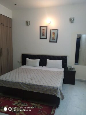 Bedroom in  Pg at Sushant Lok I – for Rent