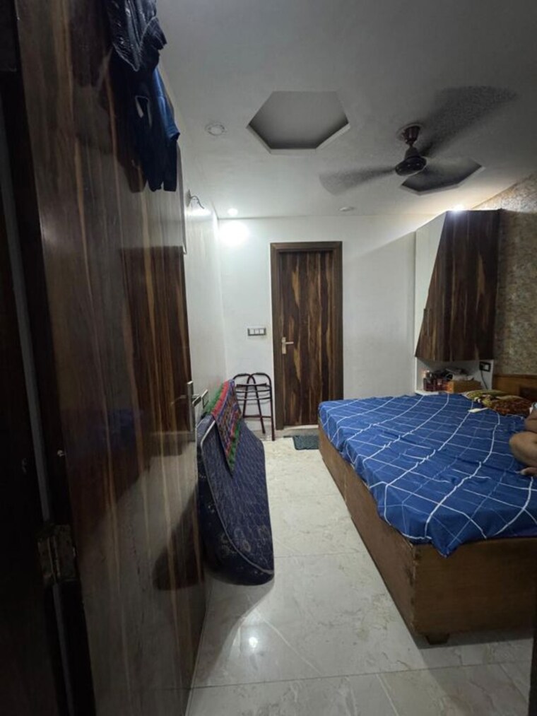 Bedroom, dwarka mor 3 Bedroom 100 Sq.Yd. Builder Floor In Dwarka Mor Delhi 10706612