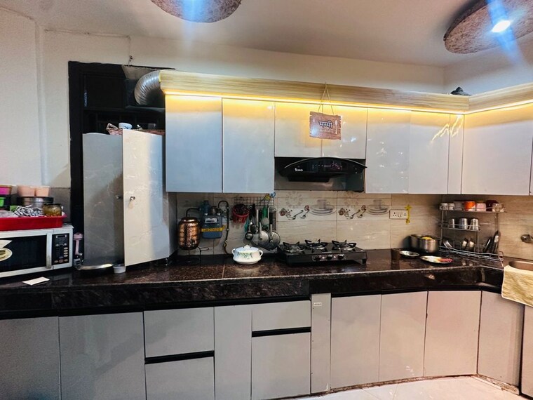 Kitchen, dwarka mor 2 Bedroom 60 Sq.Yd. Builder Floor In Dwarka Mor Delhi 10706625