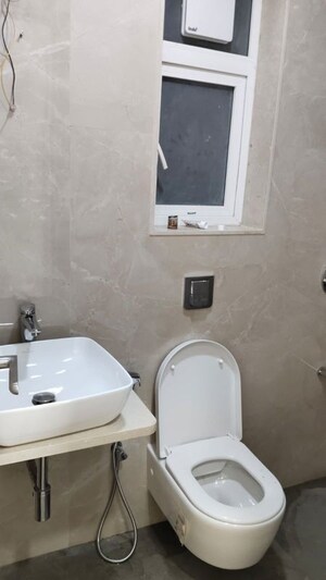 Bathroom in 2 BHK Apartment at Pratham 5TH Element, Andheri West – for Rent