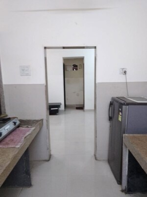 Kitchen in 1 BHK Apartment at Godrej Emerald, Ghodbunder Road – for Rent