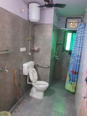 Bathroom in 3 BHK Apartment at Tilak Nagar – for Sale