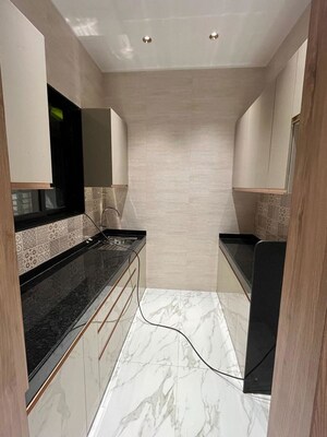 Kitchen in 2 BHK Builder Floor at Bhagwati Celestria, T.T.C. Industrial Area – for Sale