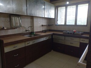 Kitchen in 4 BHK Apartment at Harsiddh Park CHS, Vasant Vihar – for Rent