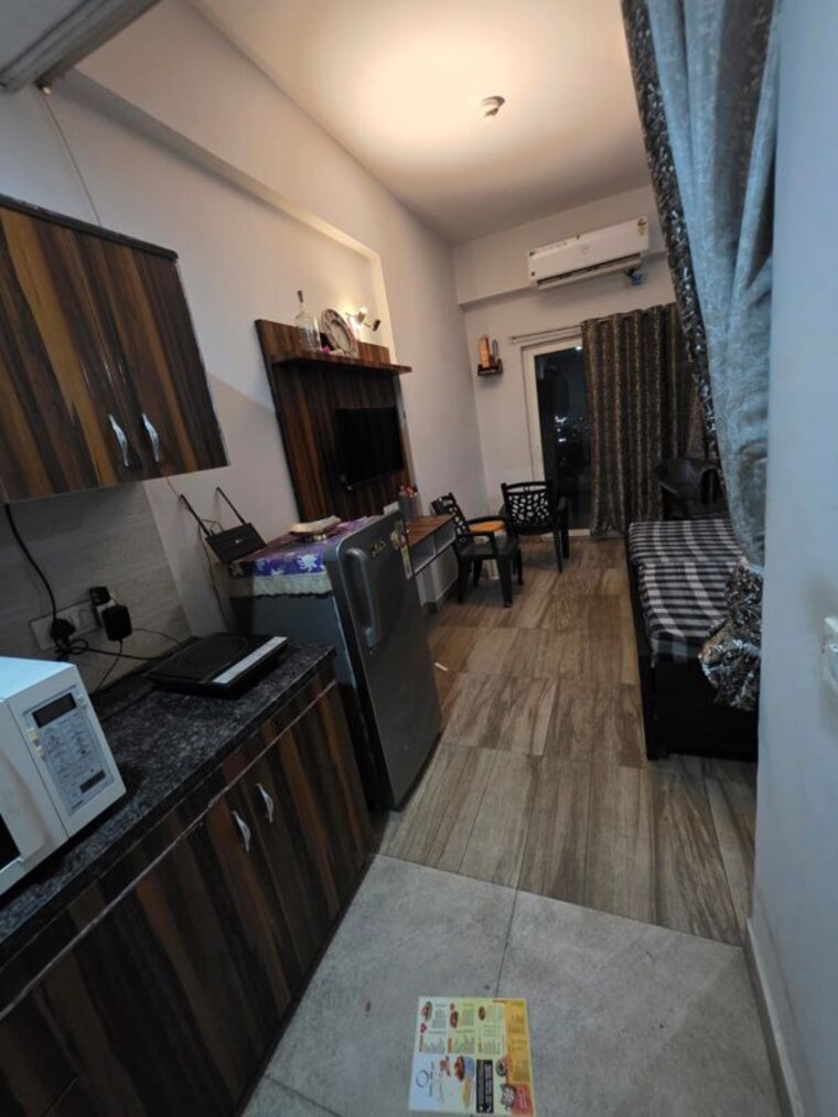 Living Room, paramount-golfforeste Studio 435 Sq.Ft. Apartment In Zeta I Greater Noida Greater Noida 10706902