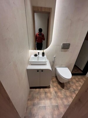 Bathroom in 3 BHK Builder Floor at Bhagwati Celestria, T.T.C. Industrial Area – for Sale