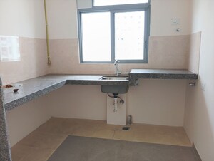 Kitchen in 1.5 BHK Apartment at Piramal Vaikunth, Balkum Pada – for Rent