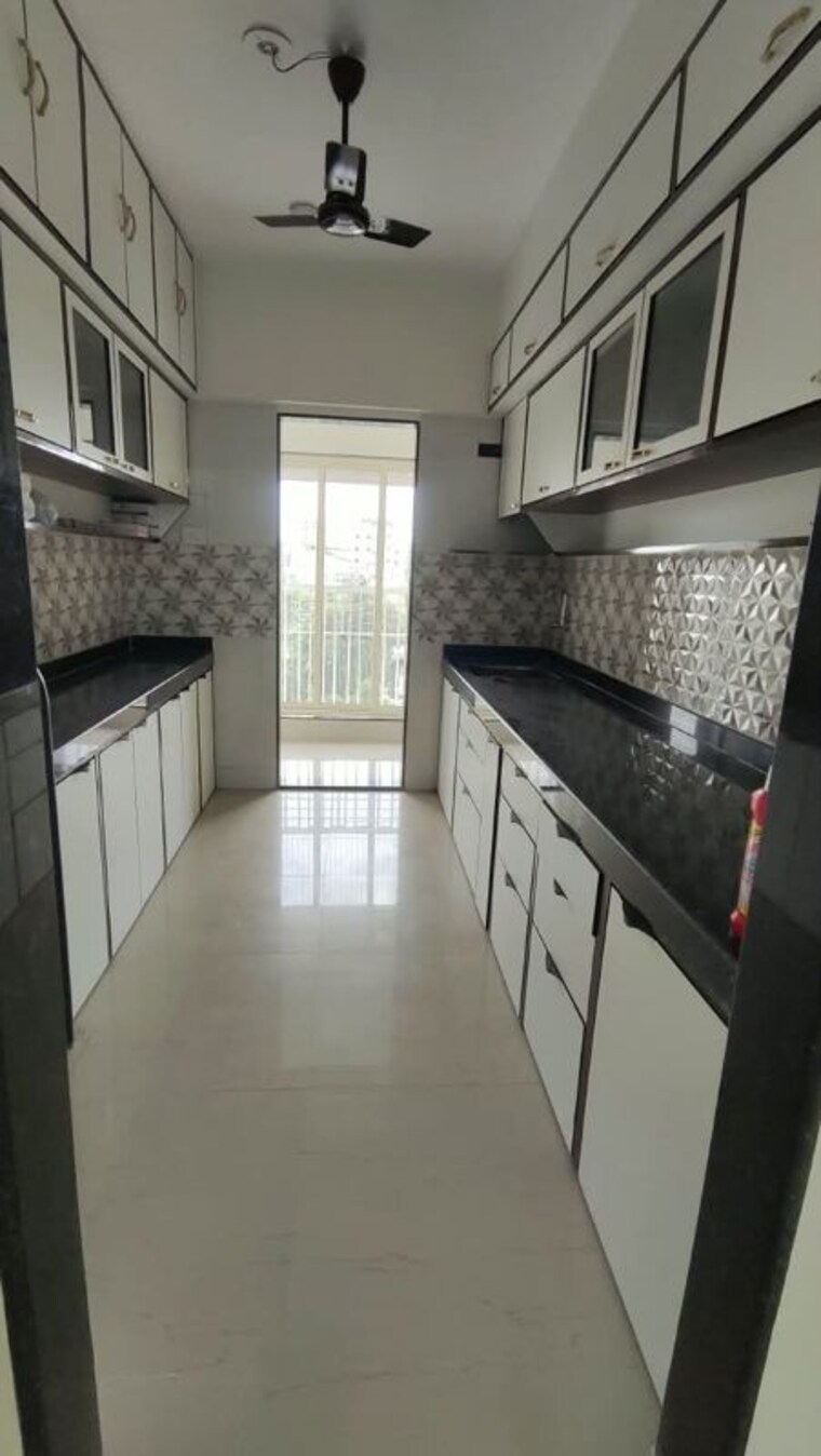 Kitchen, the-central 3 Bedroom 1100 Sq.Ft. Apartment In Chembur Mumbai 10707131