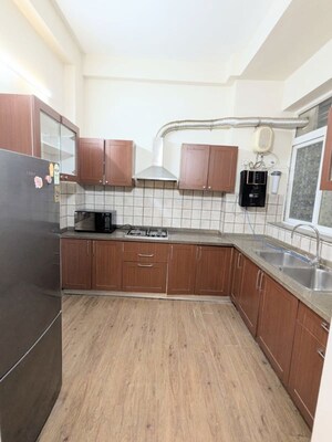 Kitchen in 4 BHK Apartment at Emaar MGF Emerald Hills, Sector 65 – for Rent