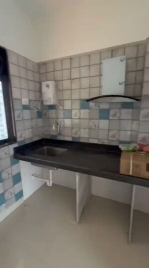 Kitchen in 2 BHK Apartment at Paradise Sai Icon, Kharghar – for Rent