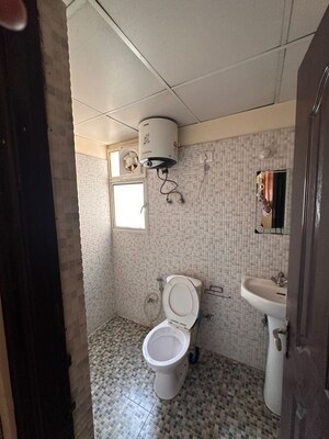 Bathroom in 2 BHK Apartment at Bankey Bihari Aggarwal Heights, Raj Nagar Extension – for Rent