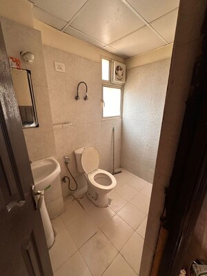 Bathroom in 2 BHK Apartment at Bankey Bihari Aggarwal Heights, Raj Nagar Extension – for Rent
