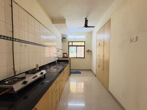 Kitchen in 2 BHK Apartment at Shubharambh Complex, Manpada – for Sale