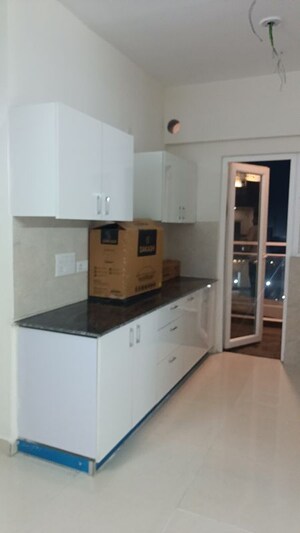 Kitchen in 2 BHK Apartment at Samridhi Luxuriya Avenue, Sector 150 – for Rent