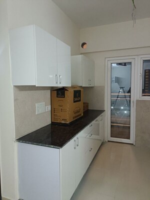 Kitchen in 2 BHK Apartment at Samridhi Luxuriya Avenue, Sector 150 – for Rent