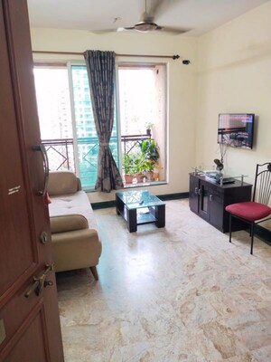 Living Room in 2 BHK Apartment at Brahmand – for Sale