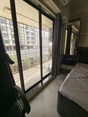 Bedroom in 3 BHK Apartment at New India Grace Luxuria, Malad West – for Sale