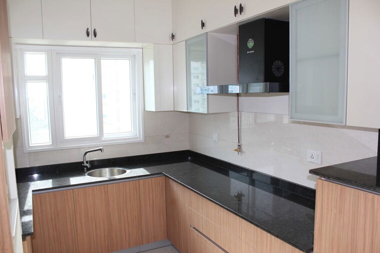 Kitchen, l-t-raintree-boulevard-phase-2 3 Bedroom 1985 Sq.Ft. Apartment In Hebbal Bangalore 10707523