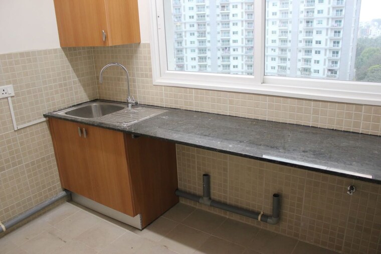 Kitchen, l-t-raintree-boulevard-phase-2 3 Bedroom 1985 Sq.Ft. Apartment In Hebbal Bangalore 10707523