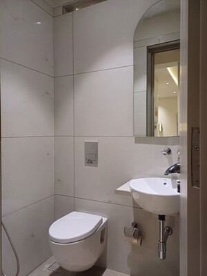 Bathroom in 2 BHK Apartment at Lashkaria Indrasukh, Andheri West – for Sale