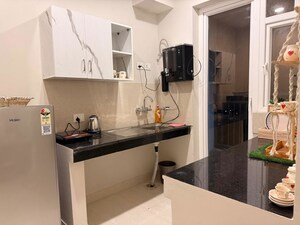 Kitchen in 2 BHK Apartment at Eldeco Live By The Greens, Sector 150 – for Rent